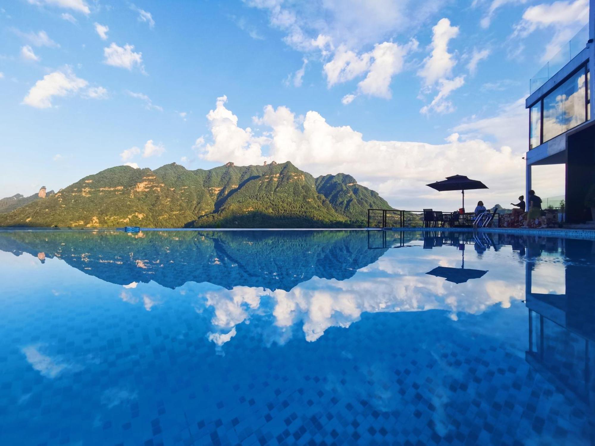 Xman Sunrise Peaks Resort Zhangjiajie Exterior foto