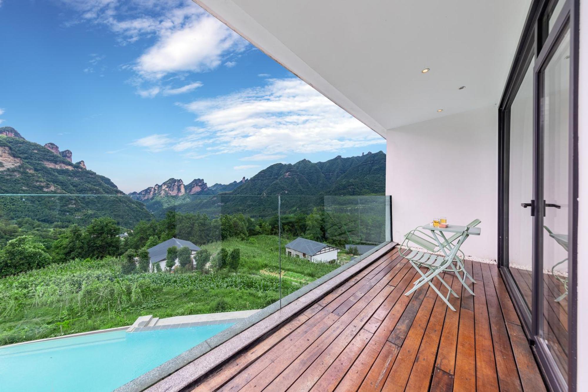 Xman Sunrise Peaks Resort Zhangjiajie Exterior foto
